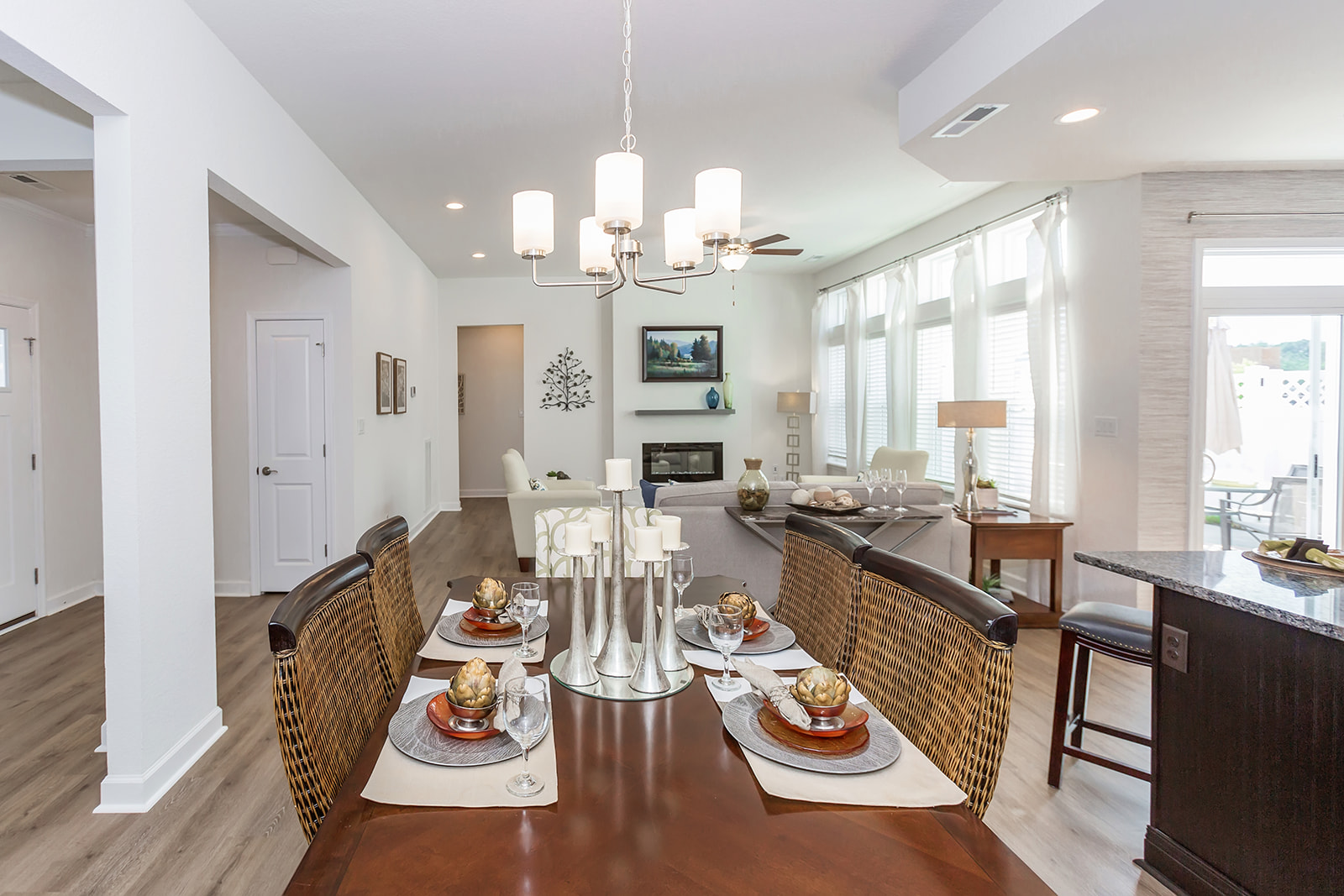 Dining room view in to the great room of the Veneto model at the Vineyards at Hallstead Reserve